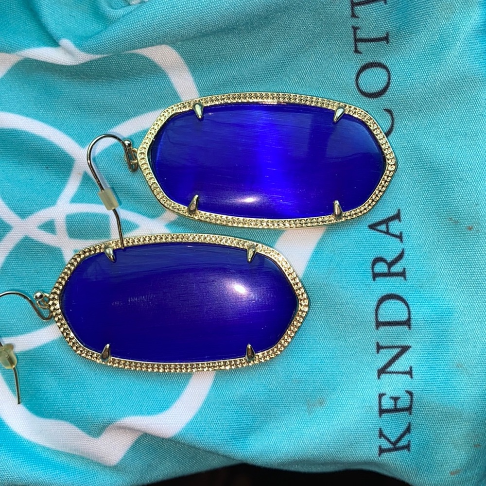 Kendra Scott earrings.